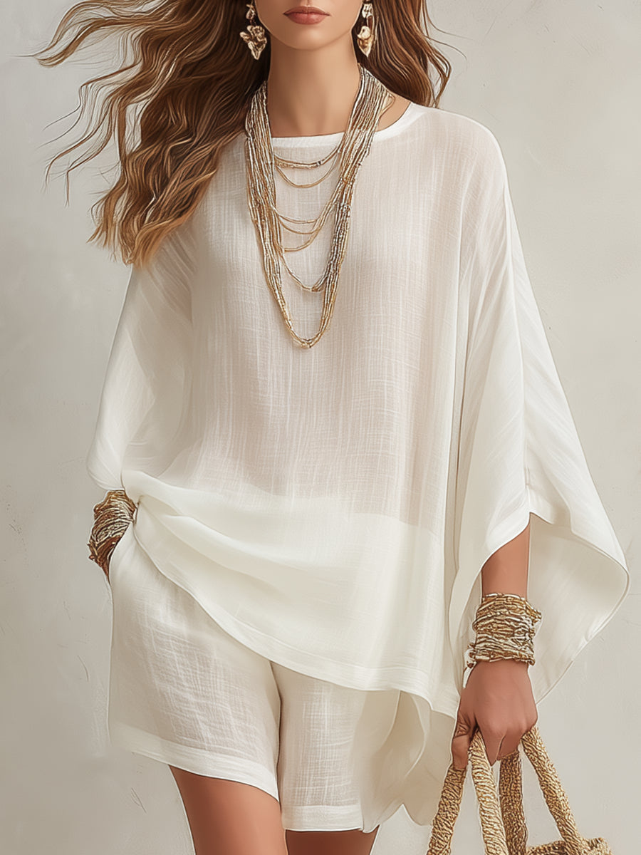 Minimalist white batwing-sleeve top and shorts set