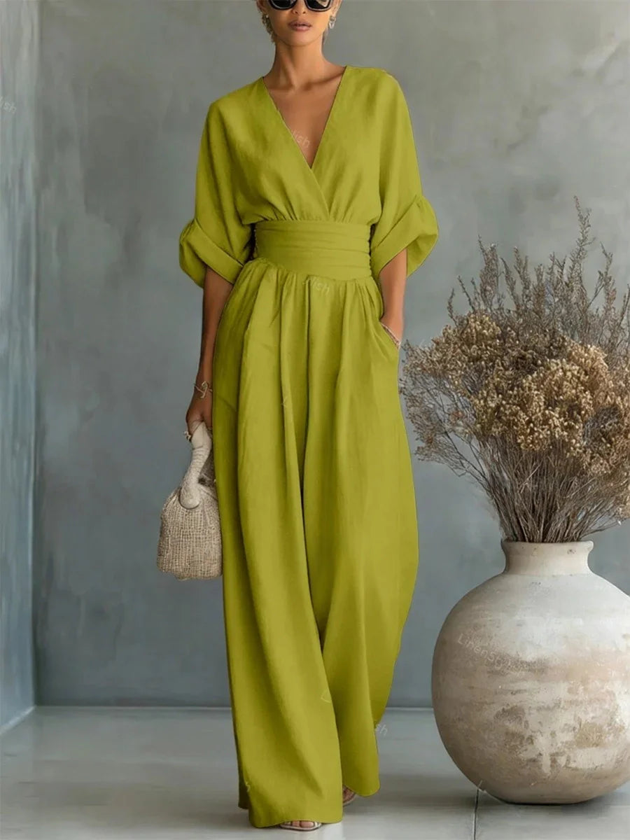 Elegante tuta con scollo a V, vita alta e gamba larga