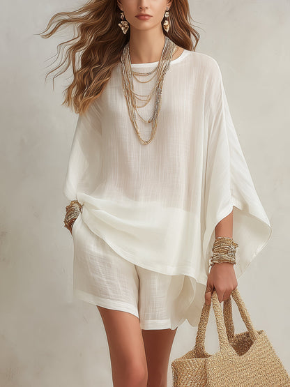 Minimalist white batwing-sleeve top and shorts set