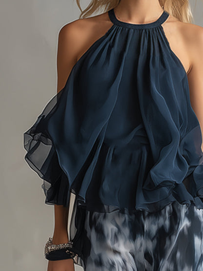 Serena | Completo elegante in chiffon con top a collo alto e pantalone a fantasia a gamba larga