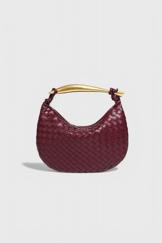 Gerda | Borsa intrecciata con manico dorato
