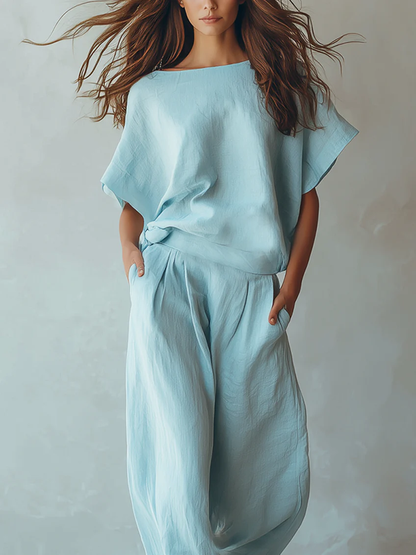 Completo Top Batwing Azzurro Chiaro e Pantaloni a Gamba Larga