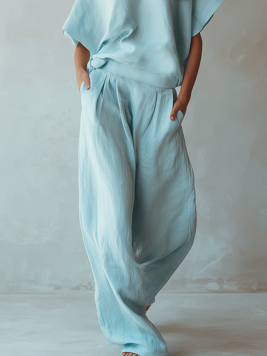 Completo Top Batwing Azzurro Chiaro e Pantaloni a Gamba Larga