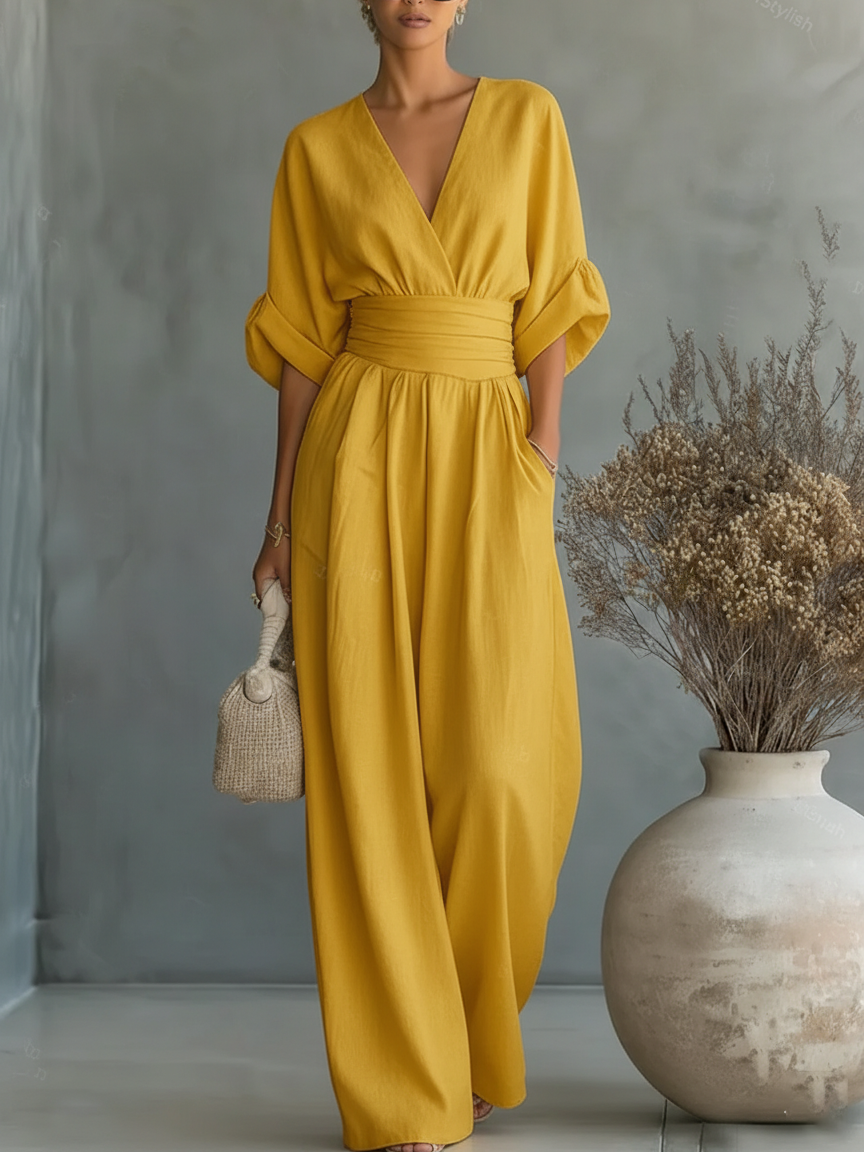 Elegante tuta con scollo a V, vita alta e gamba larga