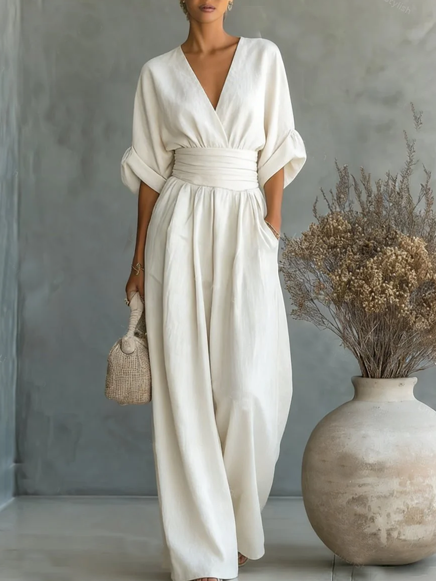 Elegante tuta con scollo a V, vita alta e gamba larga