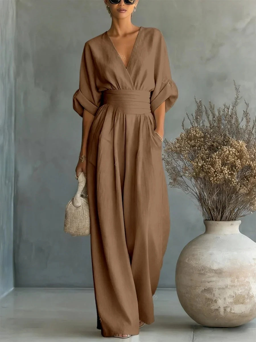Elegante tuta con scollo a V, vita alta e gamba larga