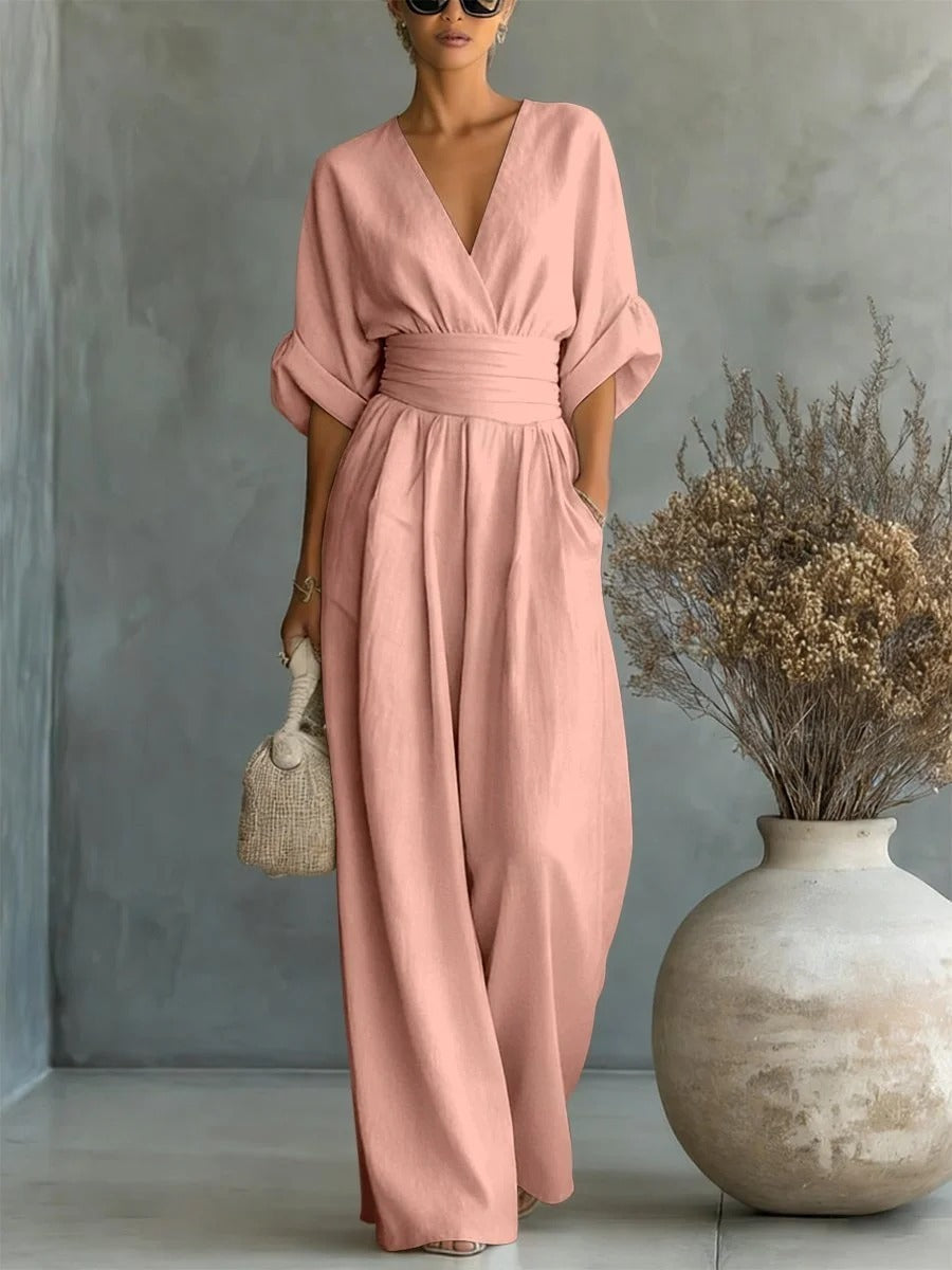 Elegante tuta con scollo a V, vita alta e gamba larga